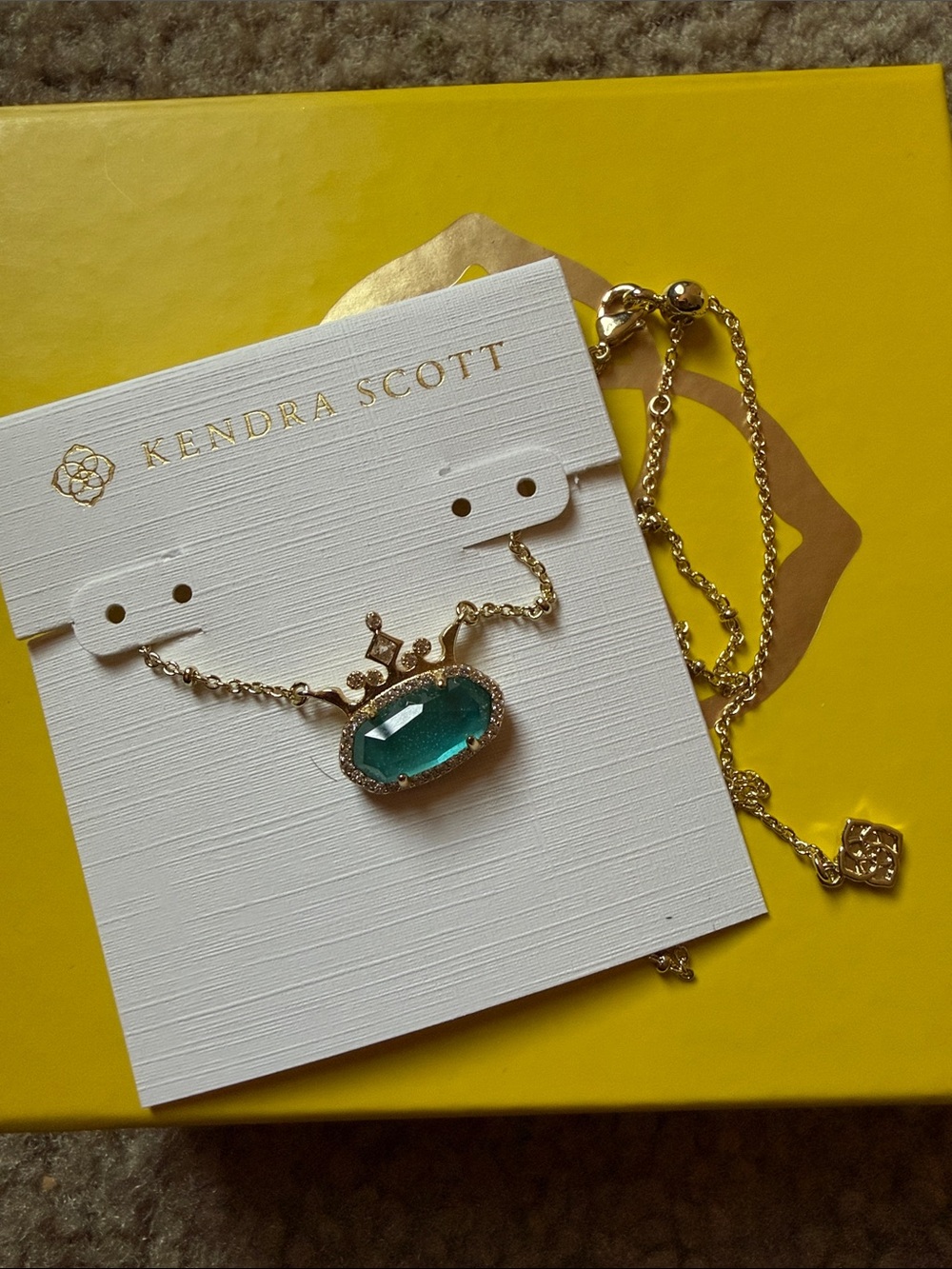 Kendra Scott Gold Necklace with Teal Pendant and Crown Accent